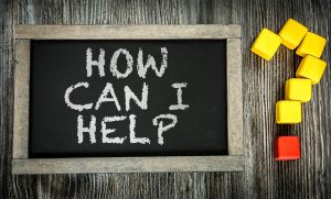 How Can I Help? written on chalkboard